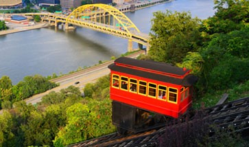 funicular with bridge and river in the background